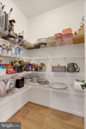 a kitchen with a stove and cabinets