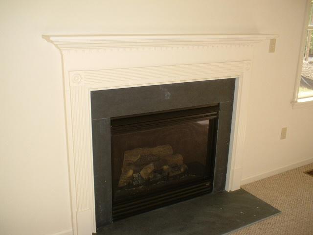 2 Summit Road Swiftwater, PA 18370 - Photo 4 of 8 a living room with a fireplace