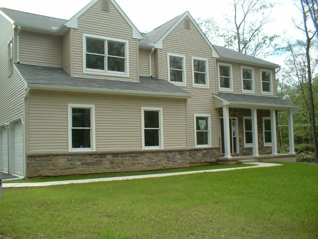 2 Summit Road Swiftwater, PA 18370 - Photo 5 of 8 a front view of a house with a yard