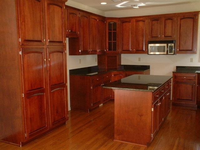 2 Summit Road Swiftwater, PA 18370 - Photo 6 of 8 a kitchen with stainless steel appliances granite countertop wooden cabinets and a refrigerator