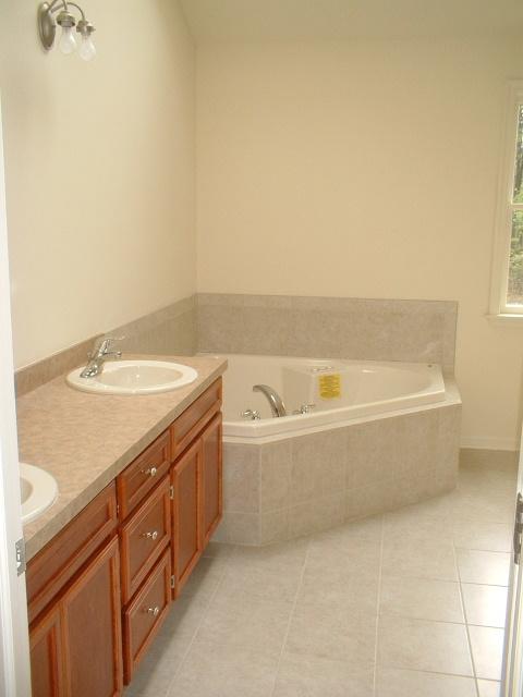 2 Summit Road Swiftwater, PA 18370 - Photo 7 of 8 a bathroom with a granite countertop sink and a bathtub