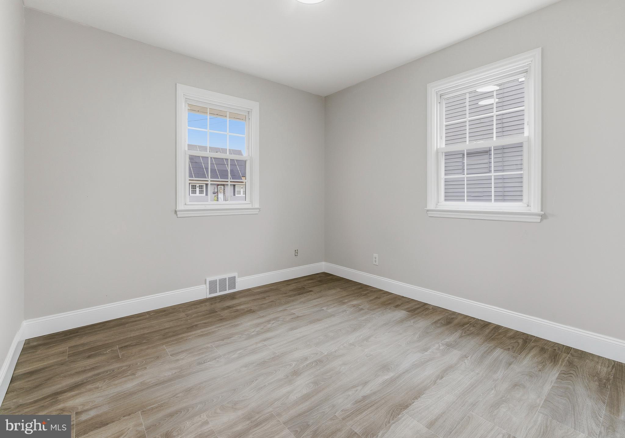 127 Madison Avenue Laurel Springs, NJ 08021 - Photo 9 of 22 an empty room with a window
