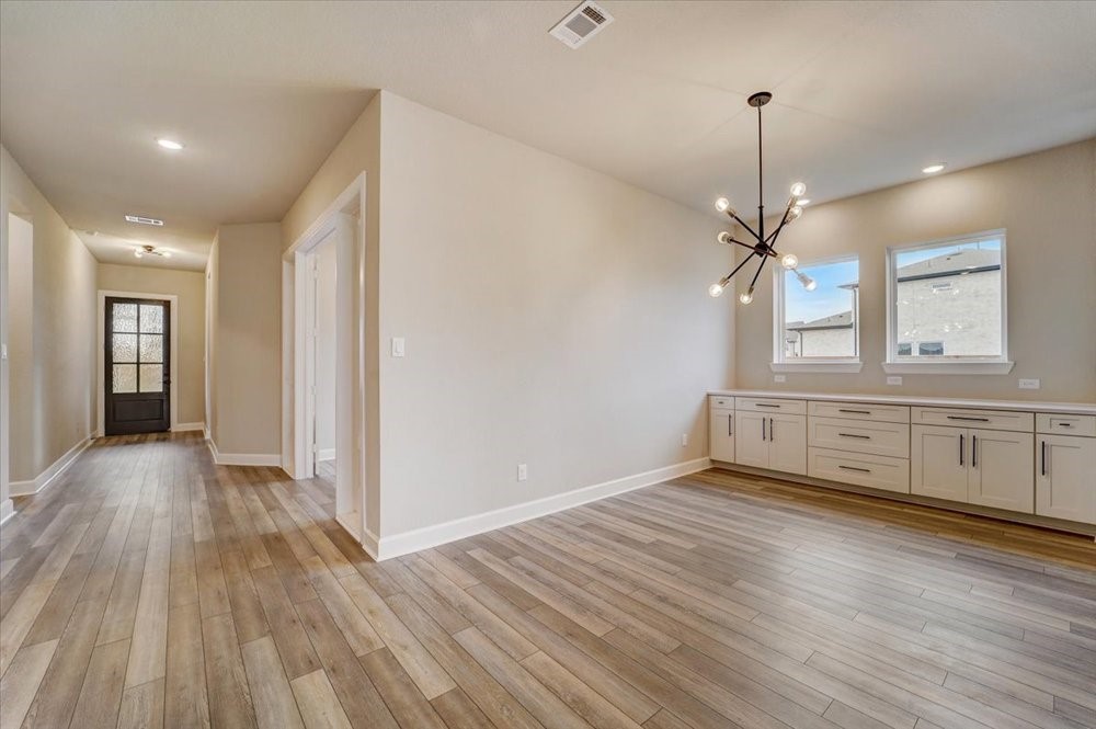 1752 Howler Way Montgomery, TX 77316 - Photo 12 of 41 REPRESENTATIVE PHOTO: Lots of extra cabinets at Dining for storage!