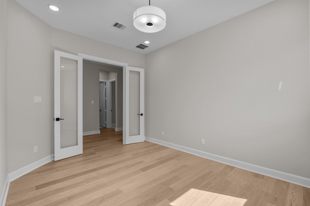 1752 Howler Way Montgomery, TX 77316 - Photo 25 of 41 REPRESENTATIVE PHOTO: Glass french doors at Study