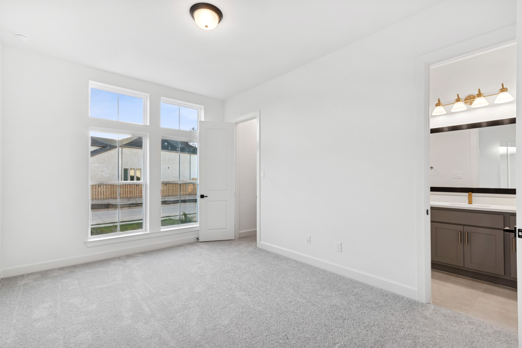 1752 Howler Way Montgomery, TX 77316 - Photo 27 of 41 REPRESENTATIVE PHOTO: Front bedroom with jack and jill bath