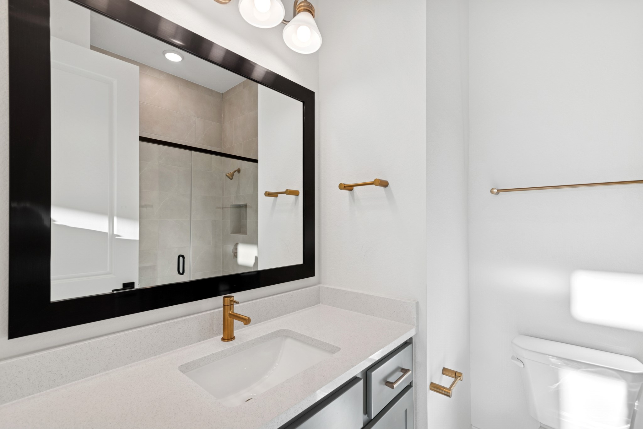 1752 Howler Way Montgomery, TX 77316 - Photo 29 of 41 REPRESENTATIVE PHOTO: En suite bath with walk in shower