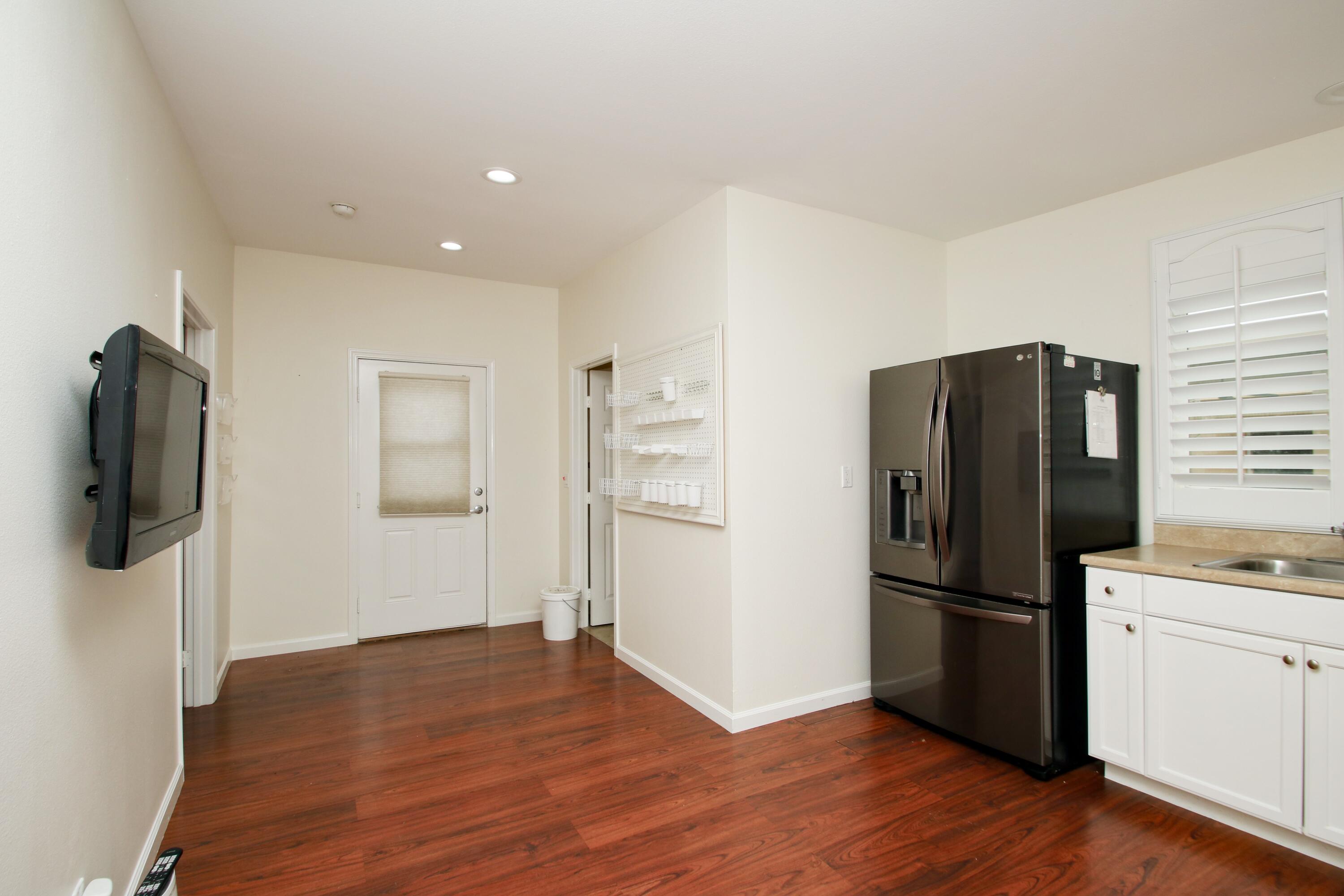 44755 Deep Canyon Road Palm Desert, CA 92260 - Photo 9 of 16 a kitchen with a refrigerator and a refrigerator