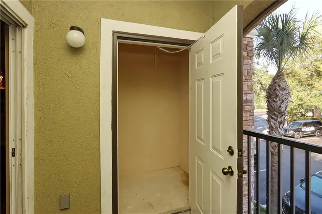 a view of a porch with seating space