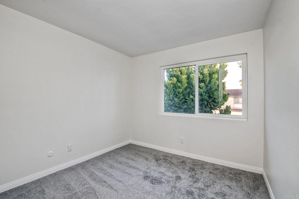 3605 Surfline Way Oceanside, CA 92056 - Photo 19 of 32 an empty room with a window