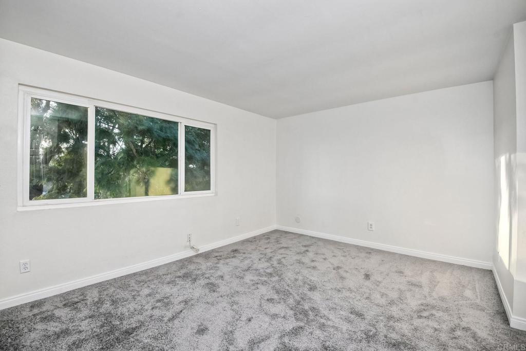 3605 Surfline Way Oceanside, CA 92056 - Photo 24 of 32 a view of an empty room with a window