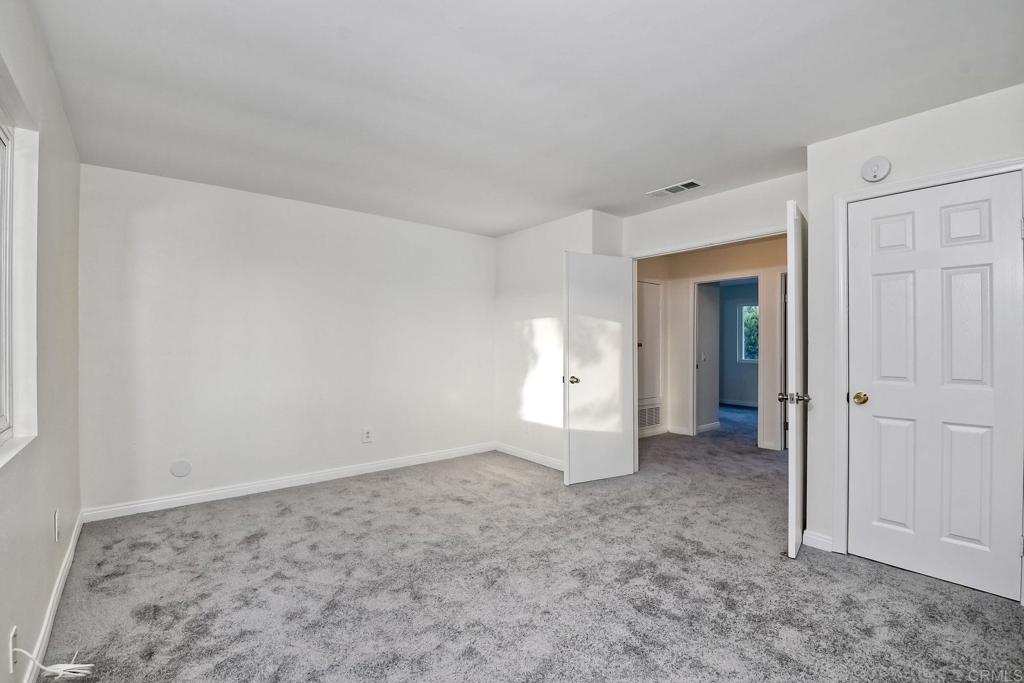 3605 Surfline Way Oceanside, CA 92056 - Photo 25 of 32 wooden floor in an empty room