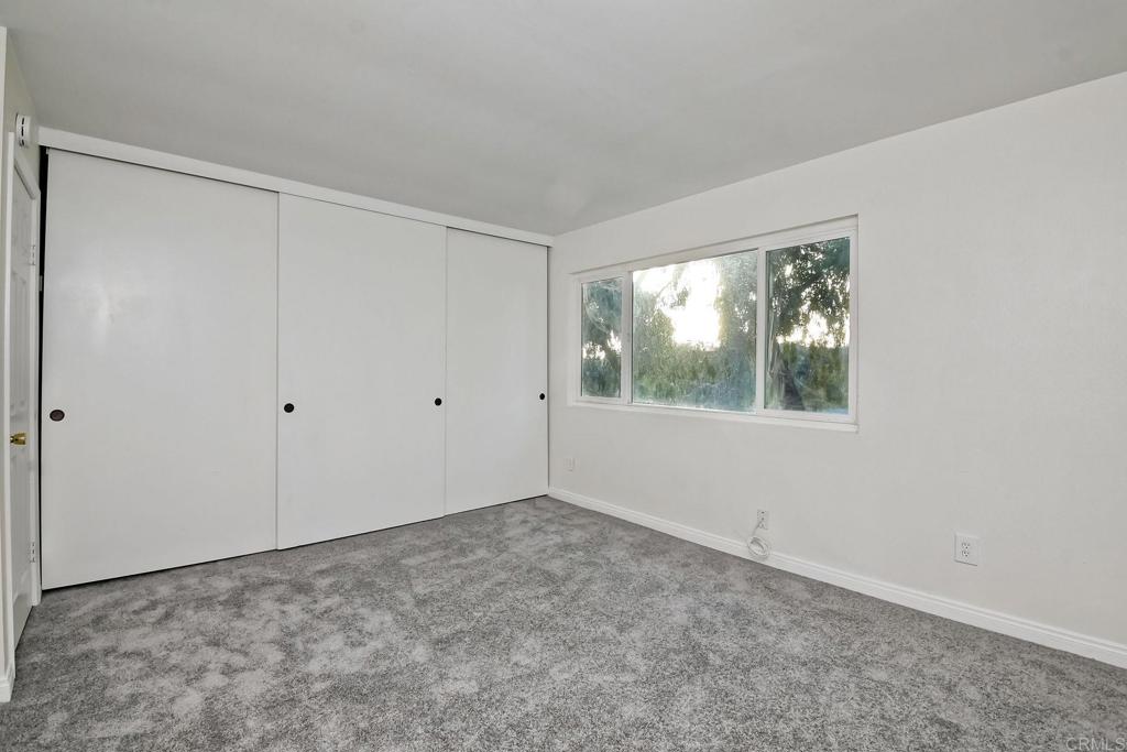 3605 Surfline Way Oceanside, CA 92056 - Photo 27 of 32 a view of an empty room with a window