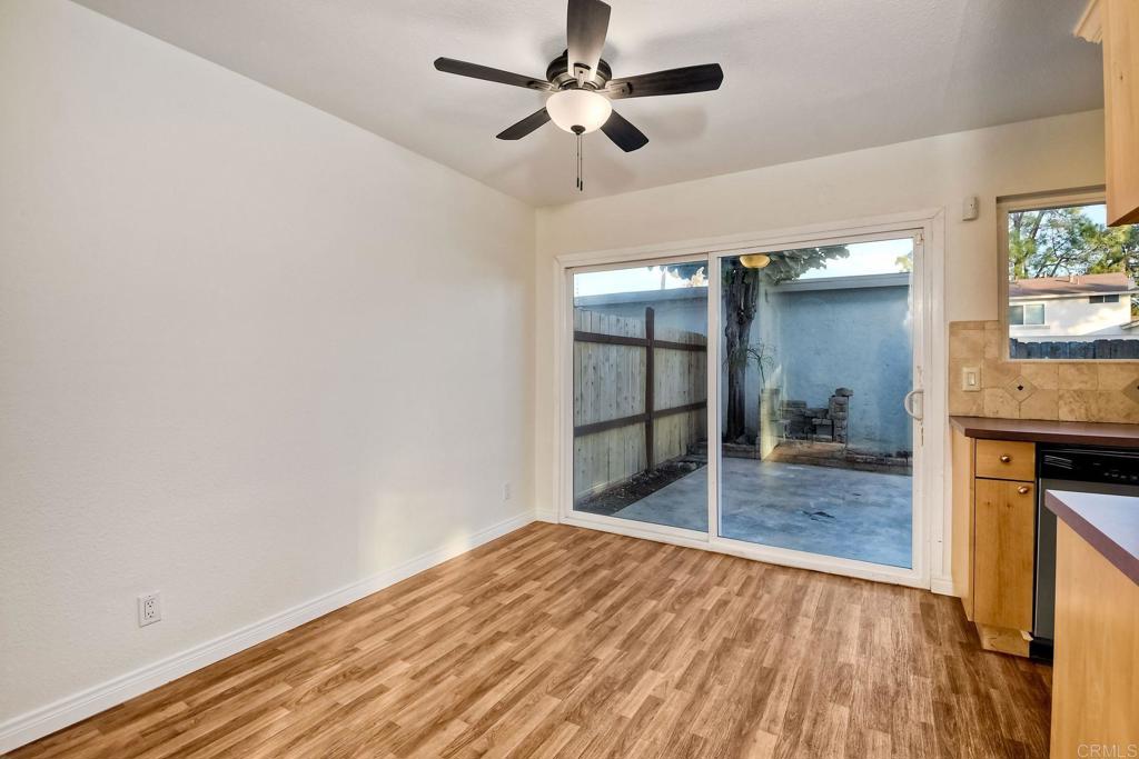 3605 Surfline Way Oceanside, CA 92056 - Photo 10 of 32 a view of empty room with wooden floor and fan