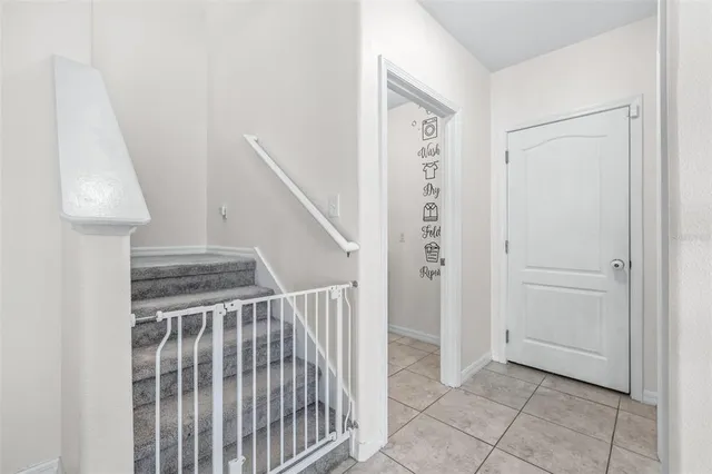 a view of entryway with stairs