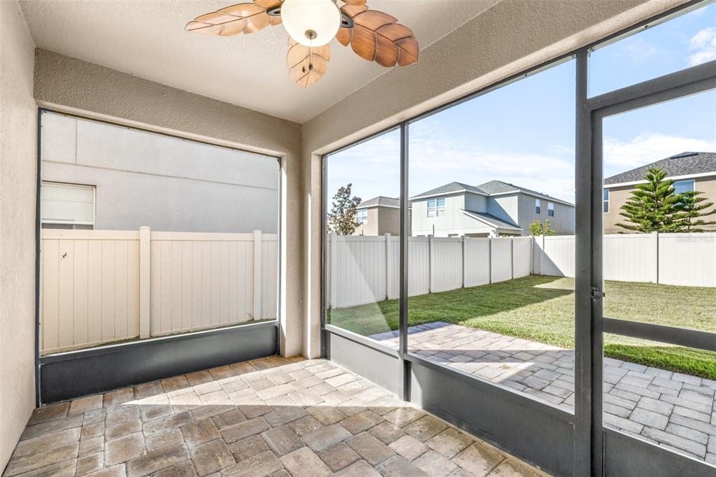 16713 Scenic Hill Way Wimauma, FL 33598 - Photo 37 of 52 a view of a bedroom with a large window