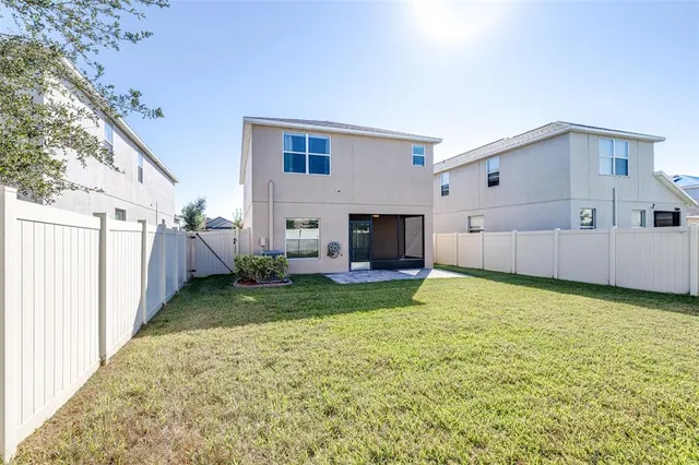 a sign board with a house