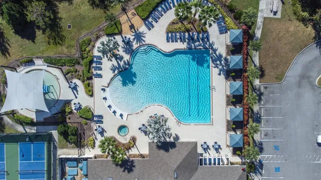 an aerial view of a house with a garden