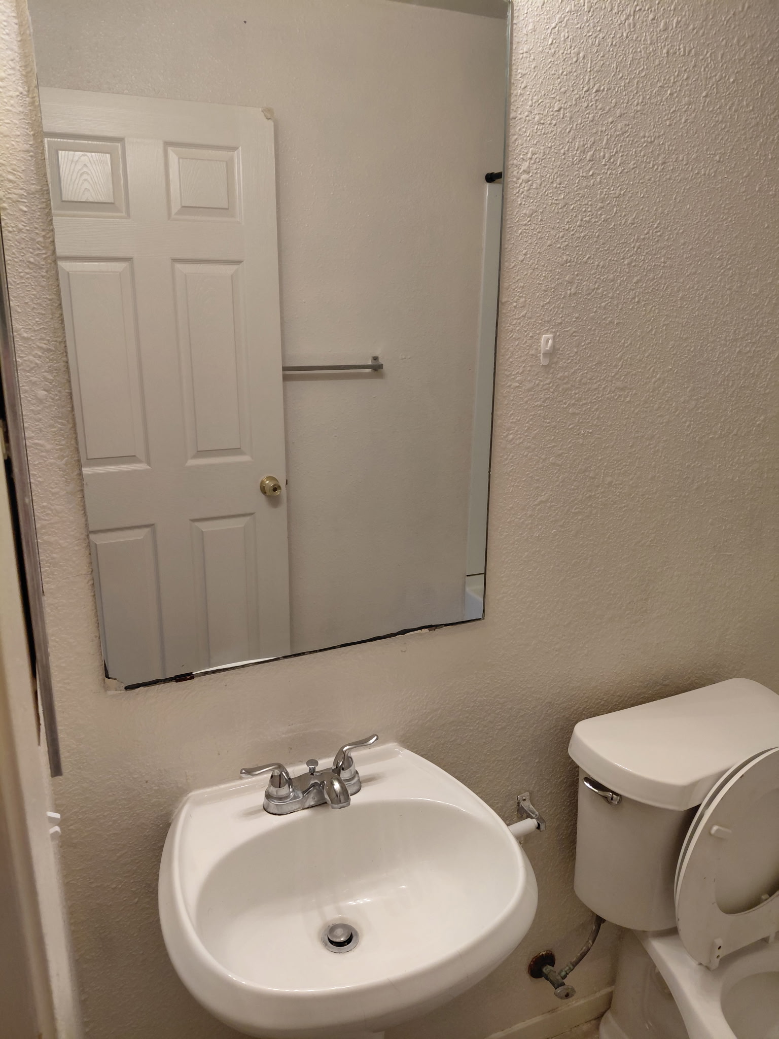 2218 Katy Lane Georgetown, TX 78626 - Photo 4 of 10 a bathroom with a sink and a toilet