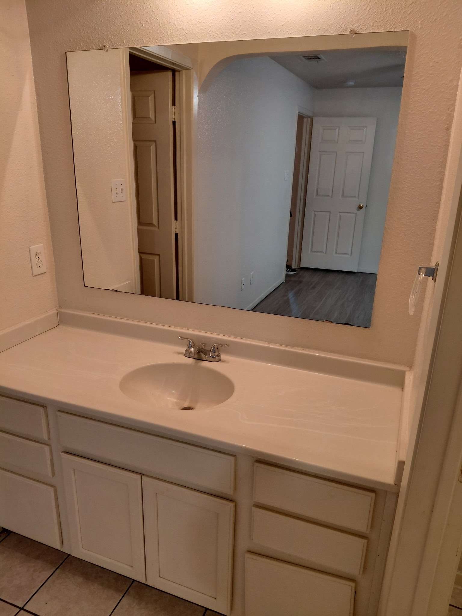 2218 Katy Lane Georgetown, TX 78626 - Photo 5 of 10 a bathroom with a sink and a mirror