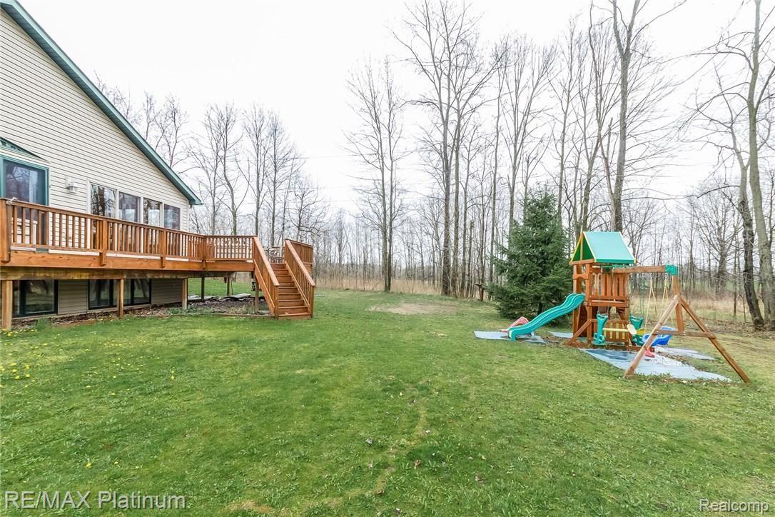 4558 North Latson Road Howell, MI 48855 - Photo 37 of 46 Viewing Deck from Ground Level (Playscape Not Included)