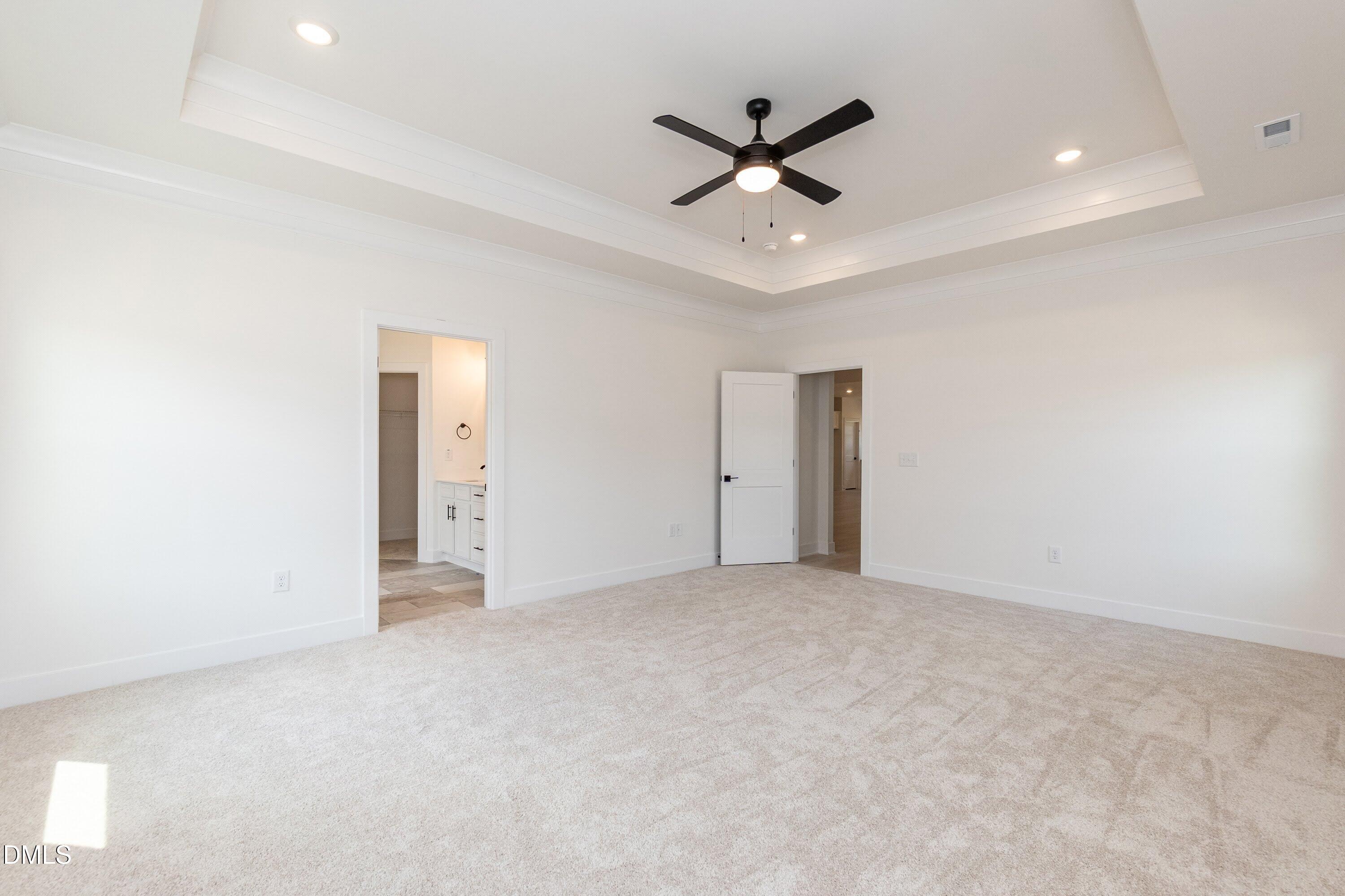 180 Galway Road Lillington, NC 27546 - Photo 23 of 41 an empty room with closet and windows