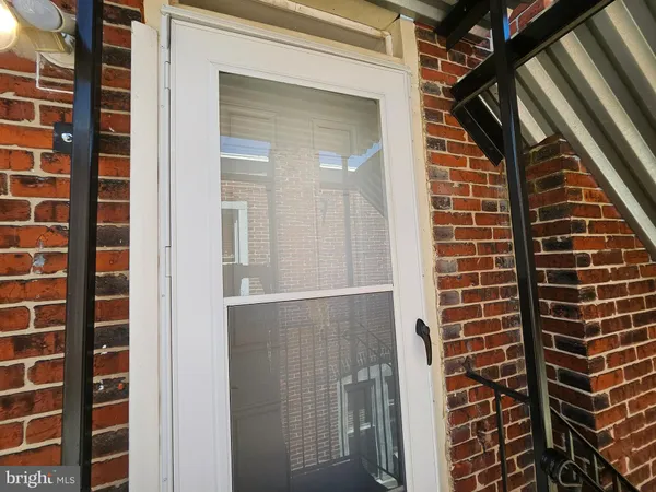 a view of a balcony with a door