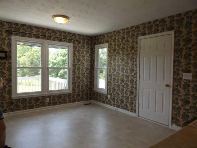 902 Franklin Road Charlotte, TN 37036 - Photo 13 of 20 Roomy Eat in Kitchen Area / Pretty view out of windows to deck and backyard