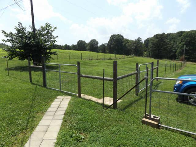 902 Franklin Road Charlotte, TN 37036 - Photo 18 of 20 1/2 of Backyard is Fenced in