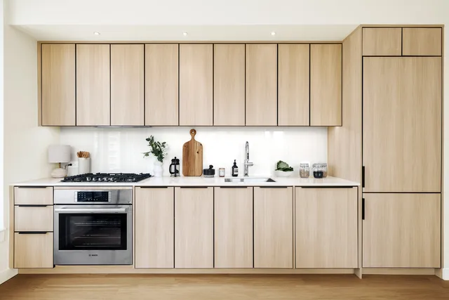 a picture of a wall with a white wall and a large window