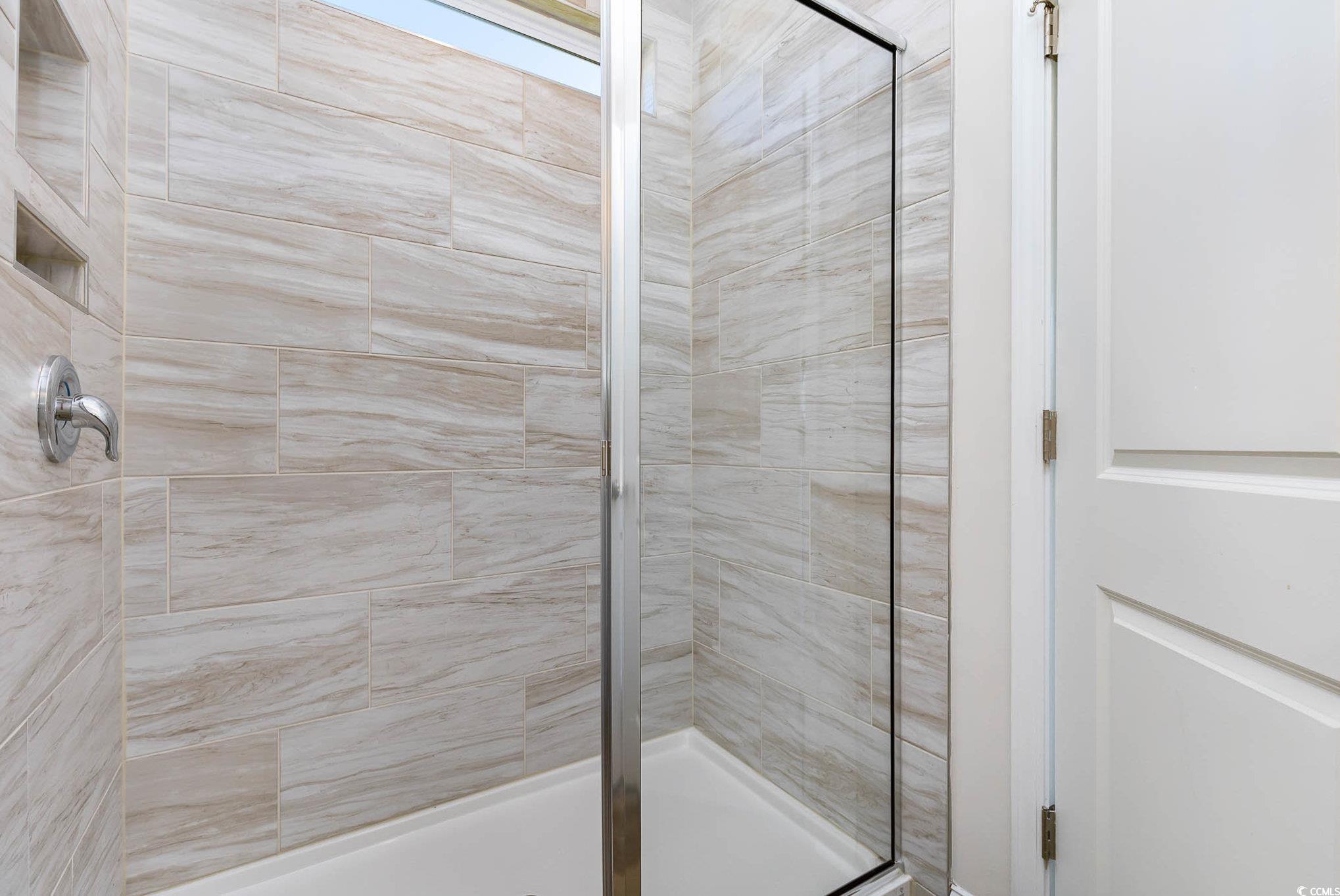 187 Bjorn Way Loris, SC 29569 - Photo 27 of 40 Full bathroom with a tile shower