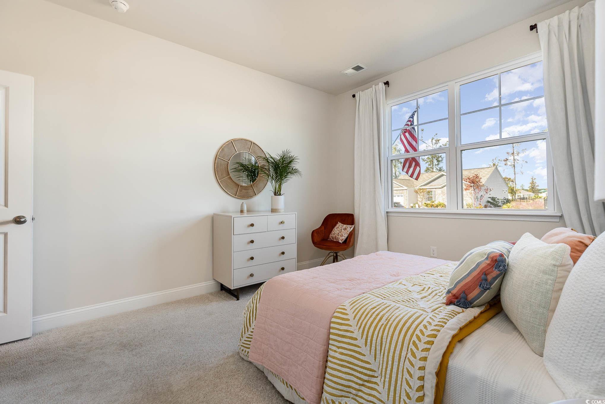 187 Bjorn Way Loris, SC 29569 - Photo 31 of 40 Bedroom with light carpet and baseboards