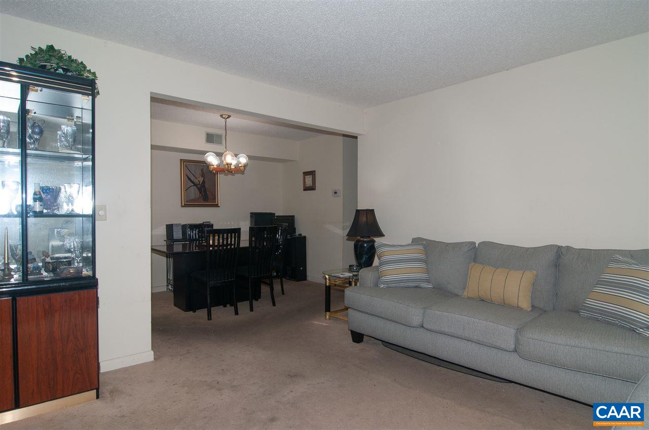 101-8 Turtle Creek Road Charlottesville, VA 22901 - Photo 3 of 21 a living room with furniture and a piano