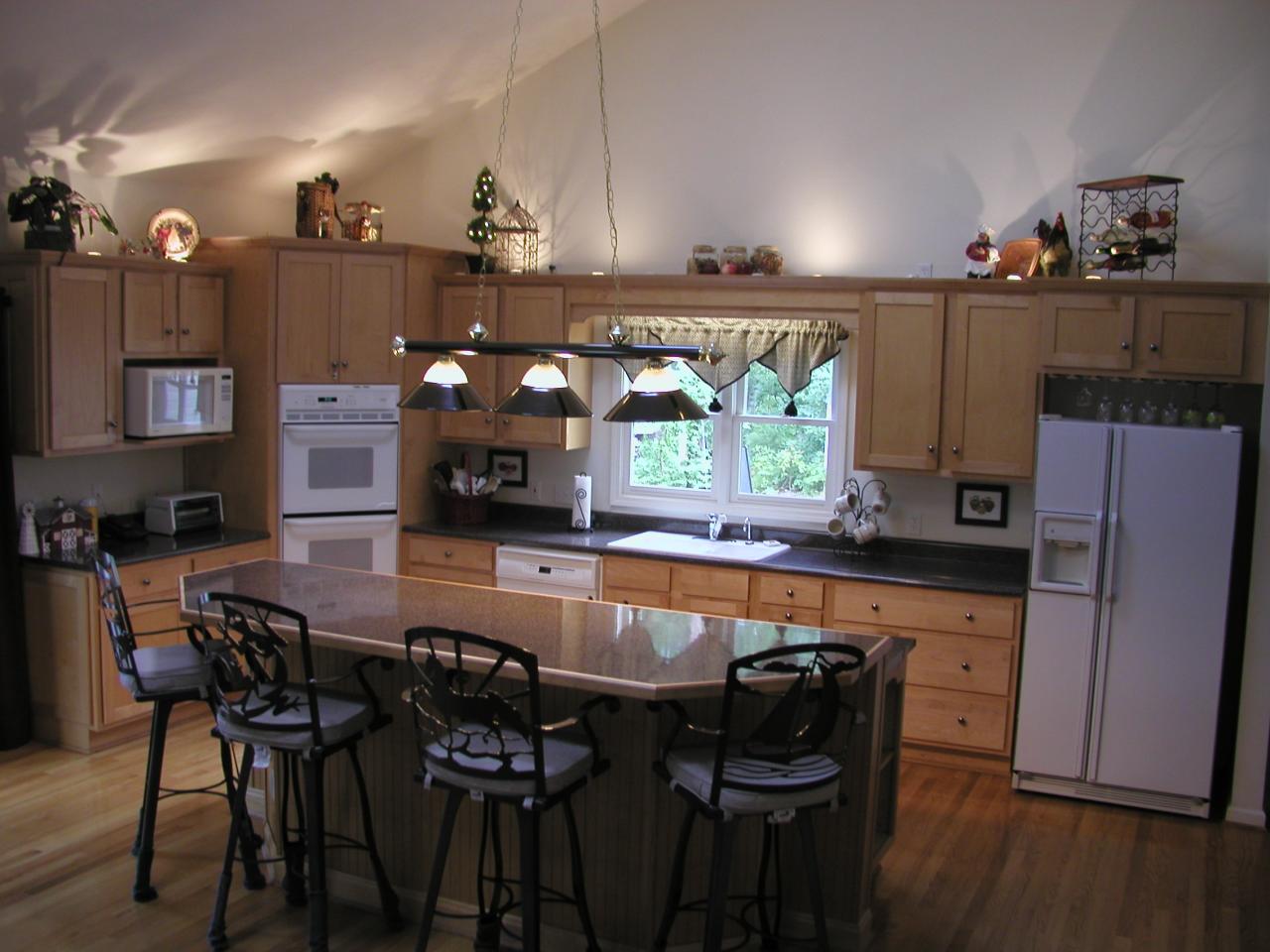 2905 New Ridge Road Elliston, VA 24087 - Photo 2 of 11 a large kitchen with a table and chairs in it