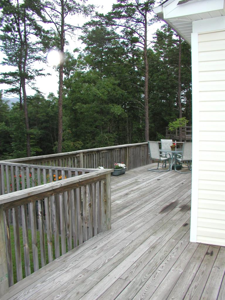 2905 New Ridge Road Elliston, VA 24087 - Photo 11 of 11 a view of a wooden deck with chairs