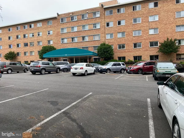 a cars parked in front of a building