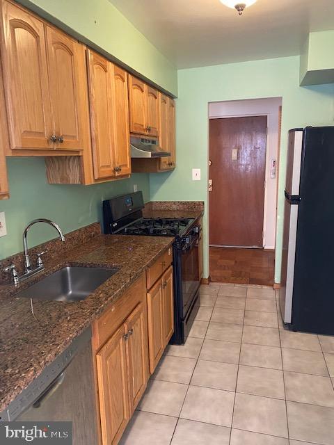 5101 8th Road South, Unit 102 Arlington, VA 22204 - Photo 6 of 22 a kitchen with stainless steel appliances granite countertop a sink stove and refrigerator