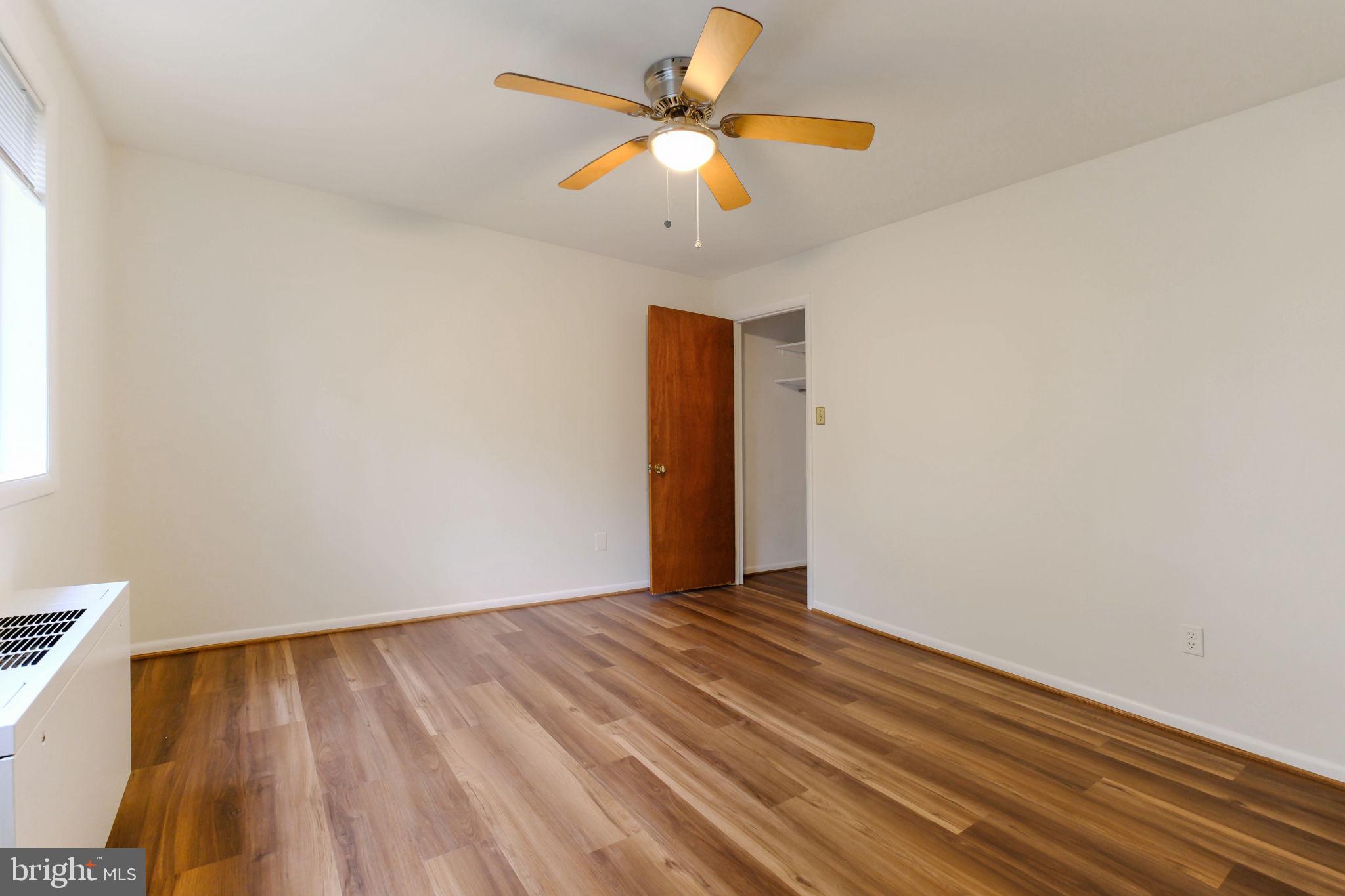 5101 8th Road South, Unit 102 Arlington, VA 22204 - Photo 7 of 19 a view of an empty room with a window
