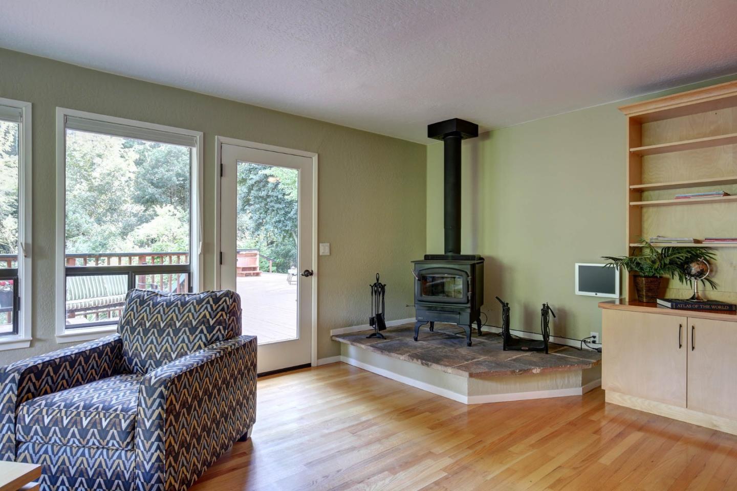 450 Bear Valley Road Aptos, CA 95003 - Photo 16 of 46 a living room with furniture rug and a window