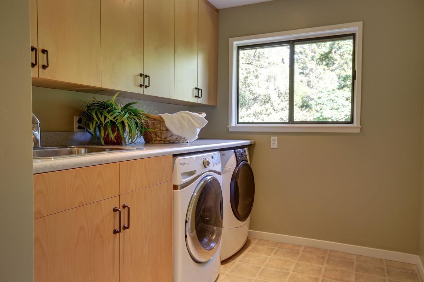 450 Bear Valley Road Aptos, CA 95003 - Photo 31 of 46 a utility room with dryer and washer