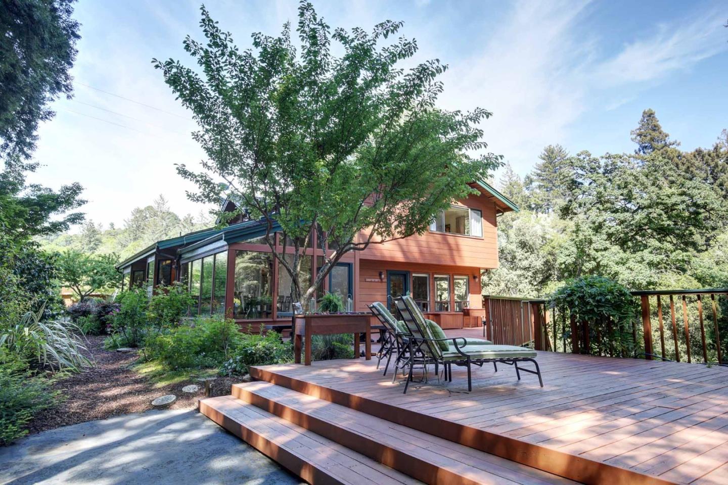450 Bear Valley Road Aptos, CA 95003 - Photo 38 of 46 a view of patio with chairs and tables with a barbeque