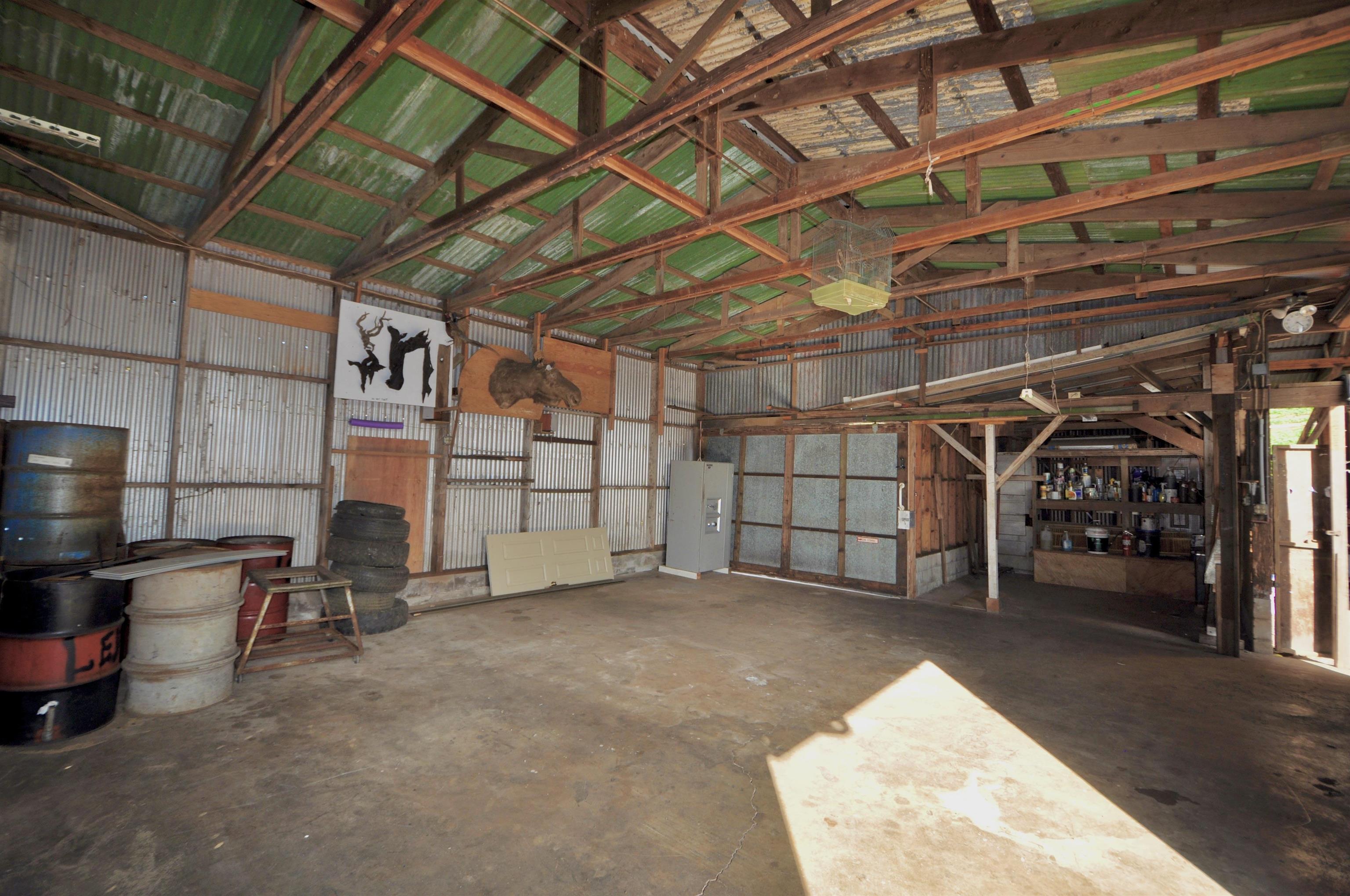 2835 Kaupakalua Road Haiku, HI 96708 - Photo 28 of 31 a view of empty room with wooden ceiling