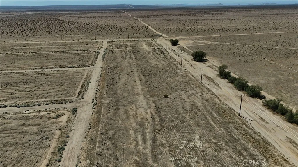 742 71st Street Edwards, CA 93523 - Photo 5 of 8 Red boundary lines on pictures are an estimate and for marketing purposes only. Buyer to verify all aspects of this property including, but not limited to utilities, assessments, boundaries, usage, access, and zoning to satisfy themselves.