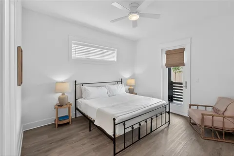a bedroom with a bed and a table in it