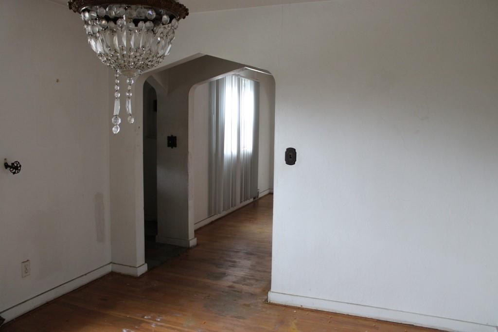 825 Liberty Street Duquesne, PA 15110 - Photo 7 of 25 a view of a hallway with wooden floor