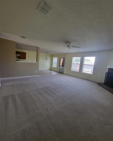 a view of a livingroom with a window