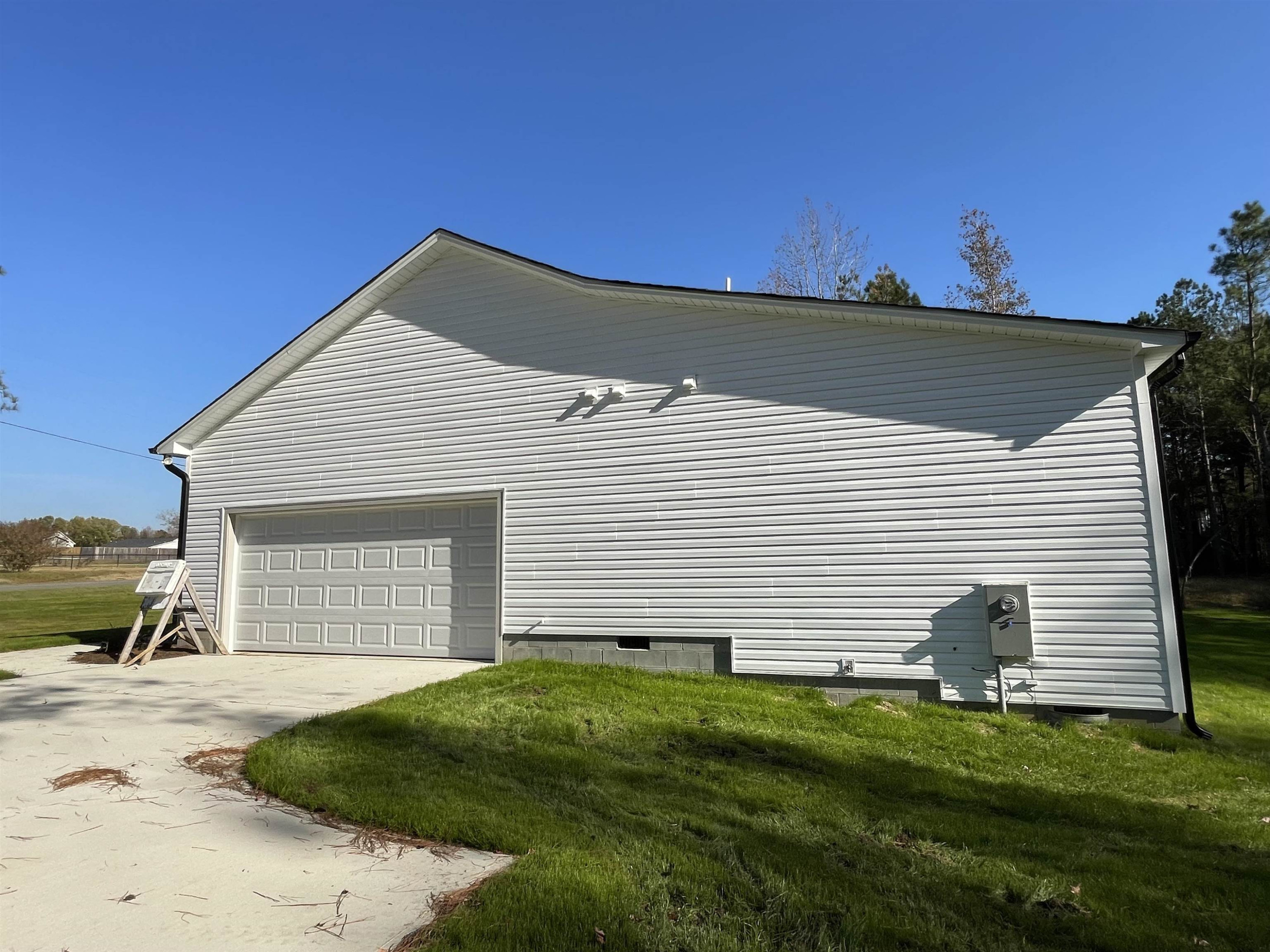 496 Roberts Road Willow Spring, NC 27592 - Photo 13 of 15 a view of backyard of house