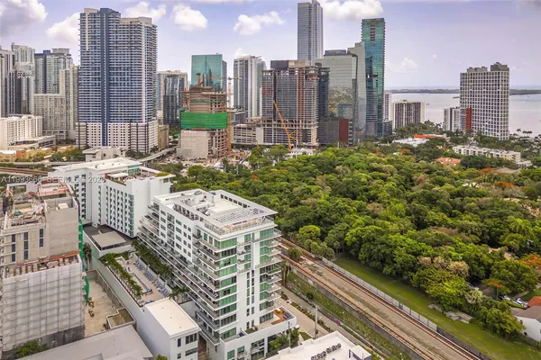 a view of city with tall buildings
