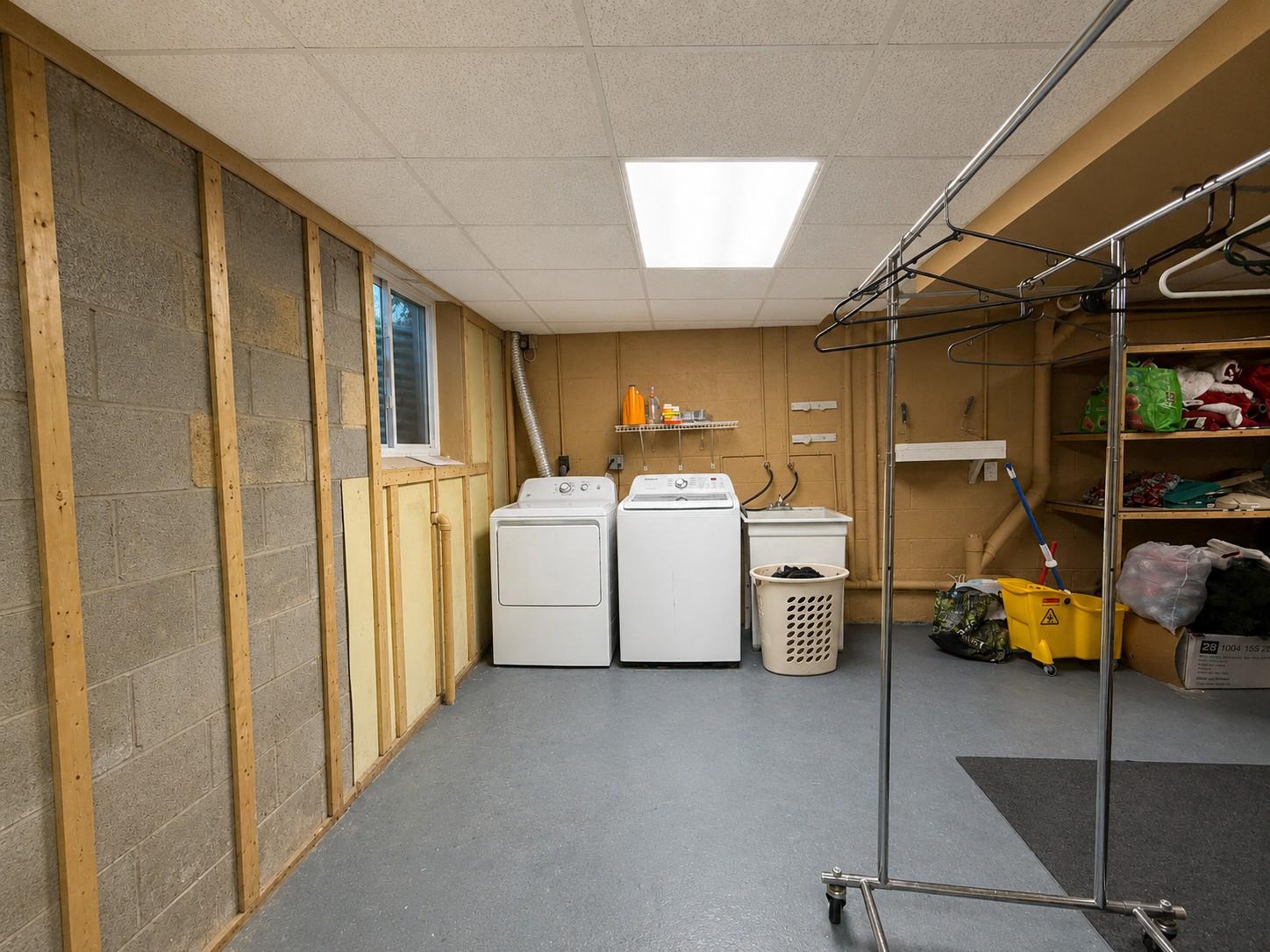 813 Thimbleberry Road, Unit 813 Baltimore, MD 21220 - Photo 24 of 32 LL: Bright and functional laundry space.