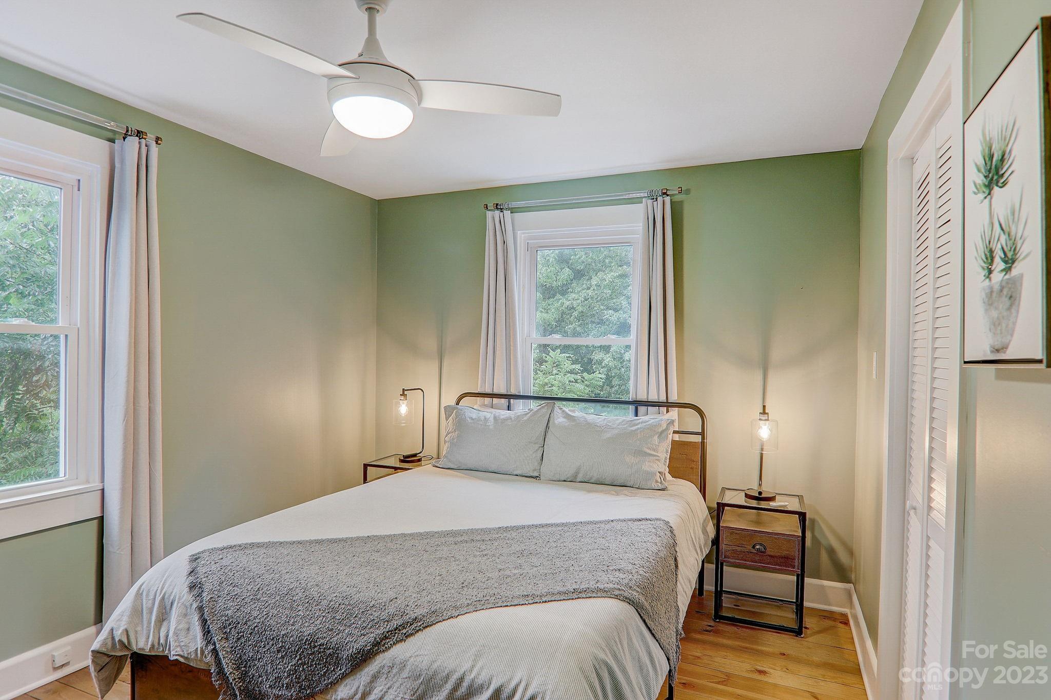 290 Upper Brush Creek Road Fletcher, NC 28732 - Photo 24 of 48 a bedroom with a bed and a window