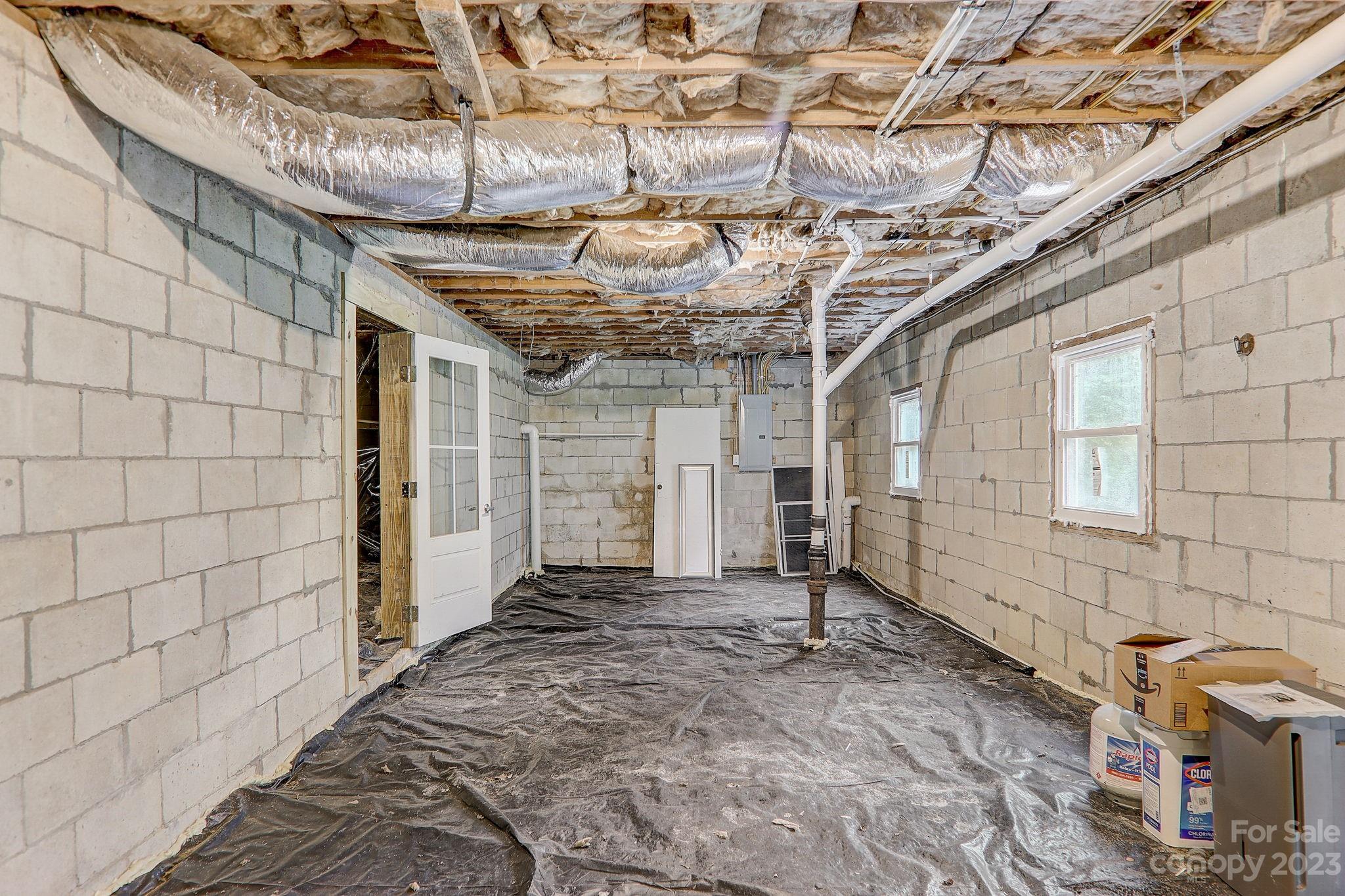 290 Upper Brush Creek Road Fletcher, NC 28732 - Photo 28 of 48 a view of a room with a wooden floor